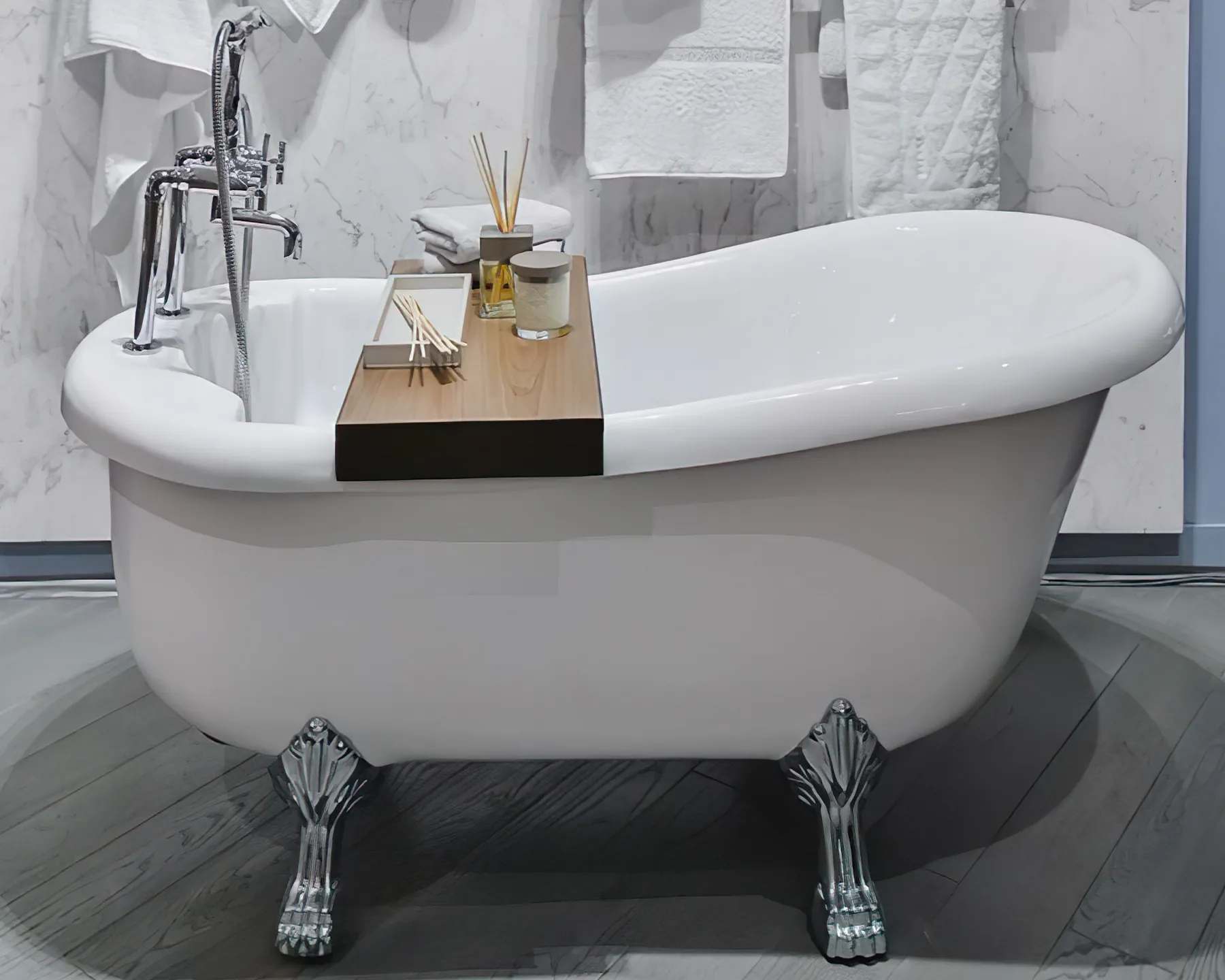 Placeholder before photo of a clawfoot bathtub.